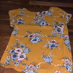 flower blouse with small tiny stain